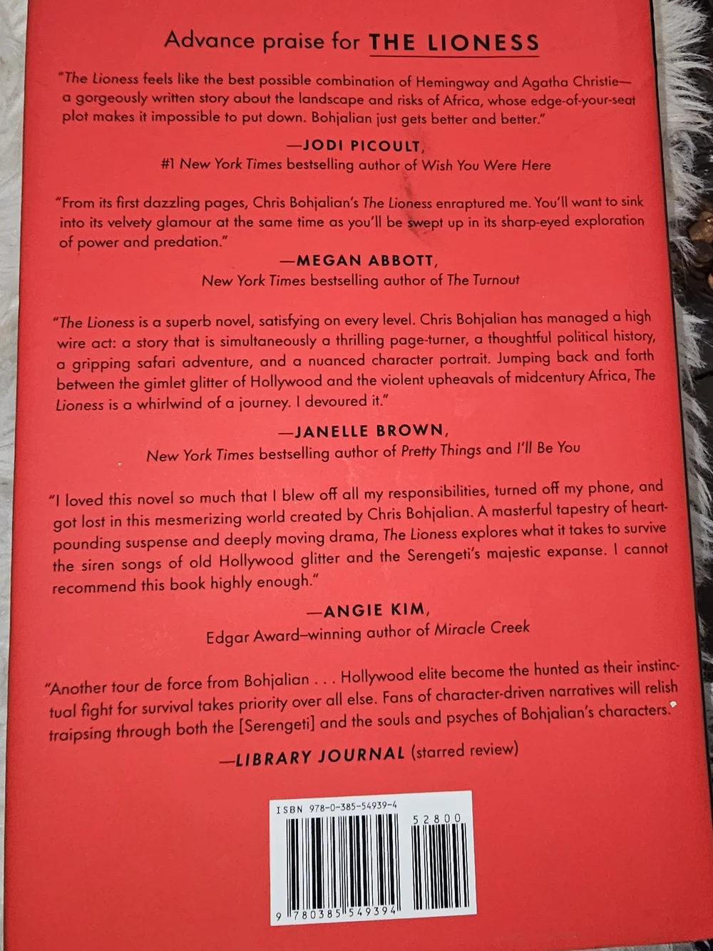 The Lioness by Chris Bohjalian — Hardcover Novel with Red Accent Slashes